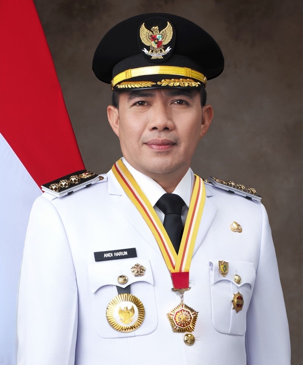 Dr. H. Andi Harun, S.T., S.H., M.Si.